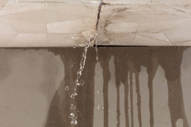 Professional Flood Damage Cleanup technician working in Orosi, CA